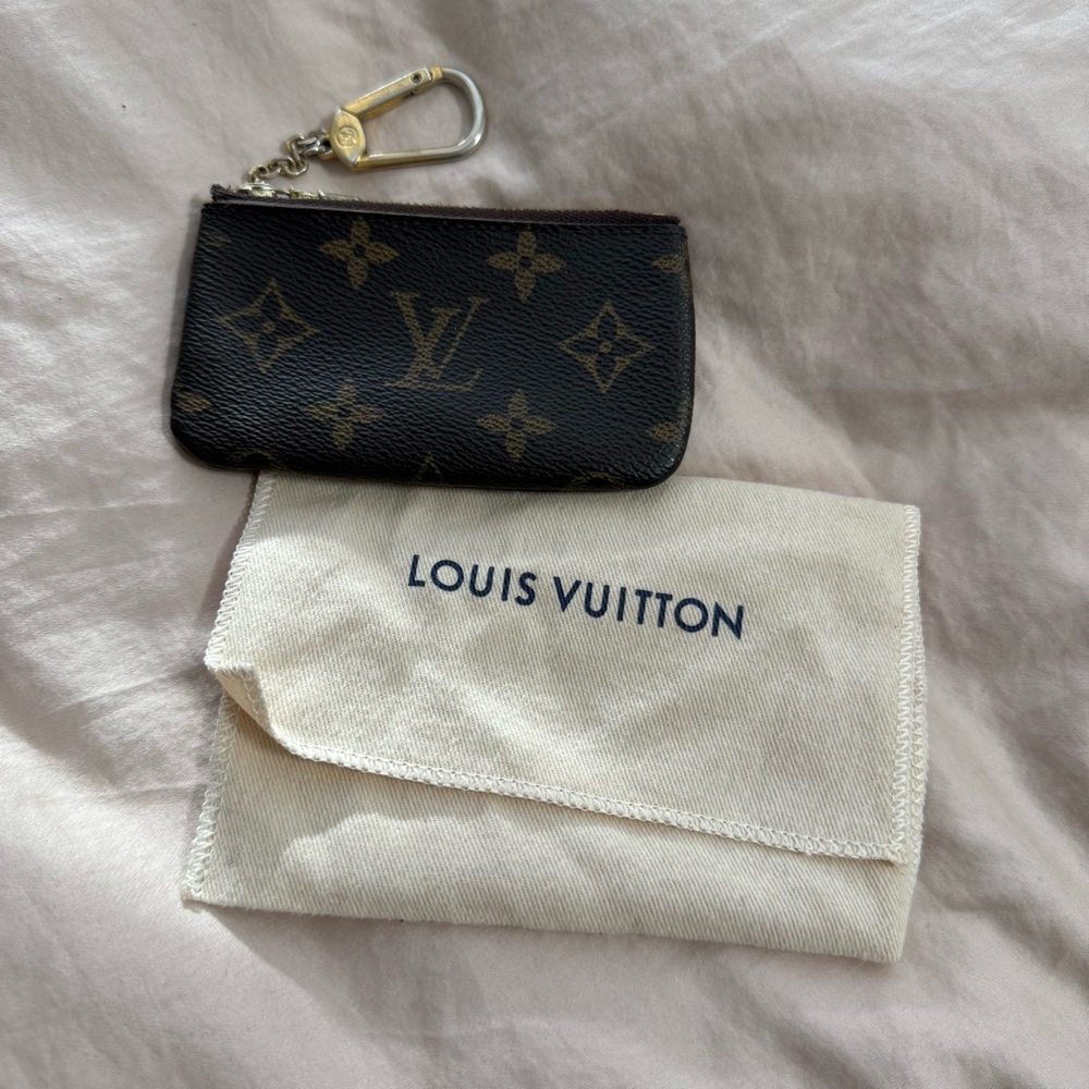 Authentic Louis Vuitton Black and Gold Monogram Pouch